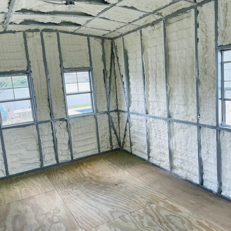 Closed-cell spray foam insulation applied to wall cavities in a residential project in Oceola